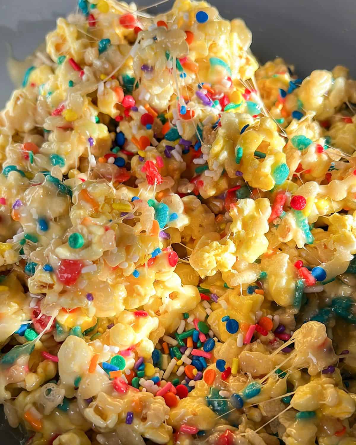 making funfetti cake batter popcorn in a pan