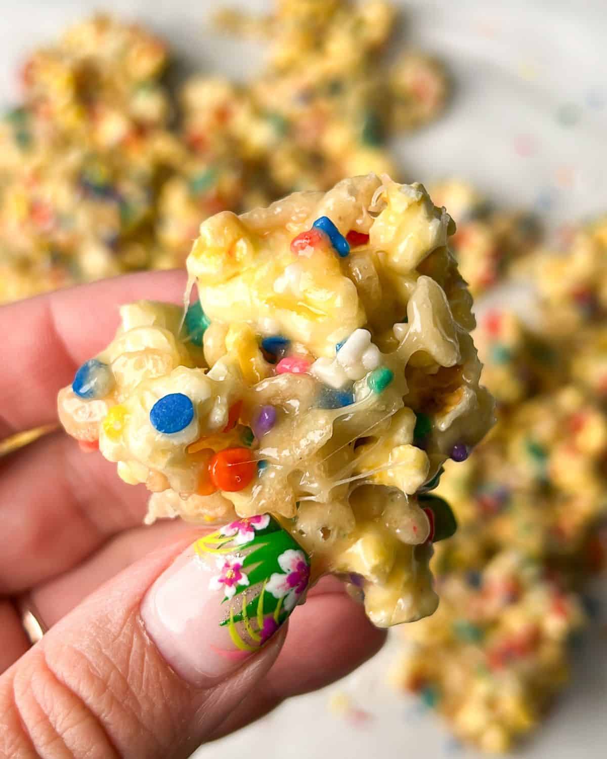 cake batter popcorn in hand
