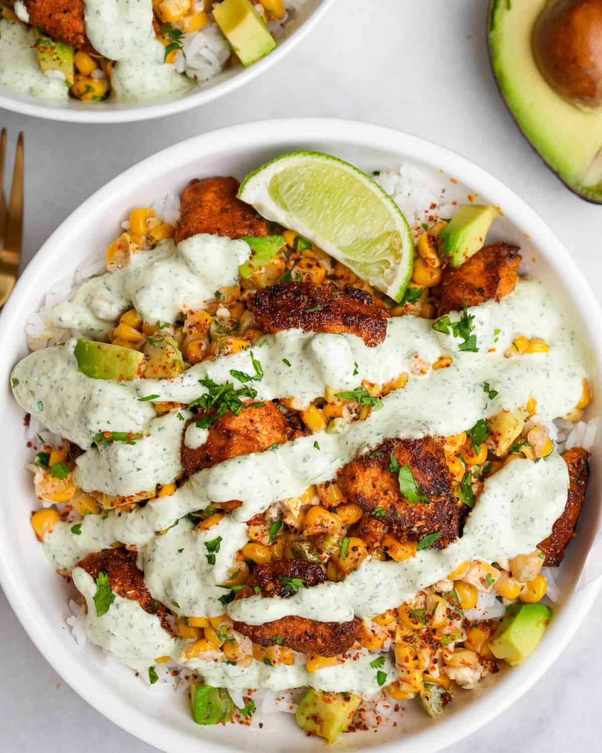 rice bowls with chicken, street corn and creamy jalapeno sauce