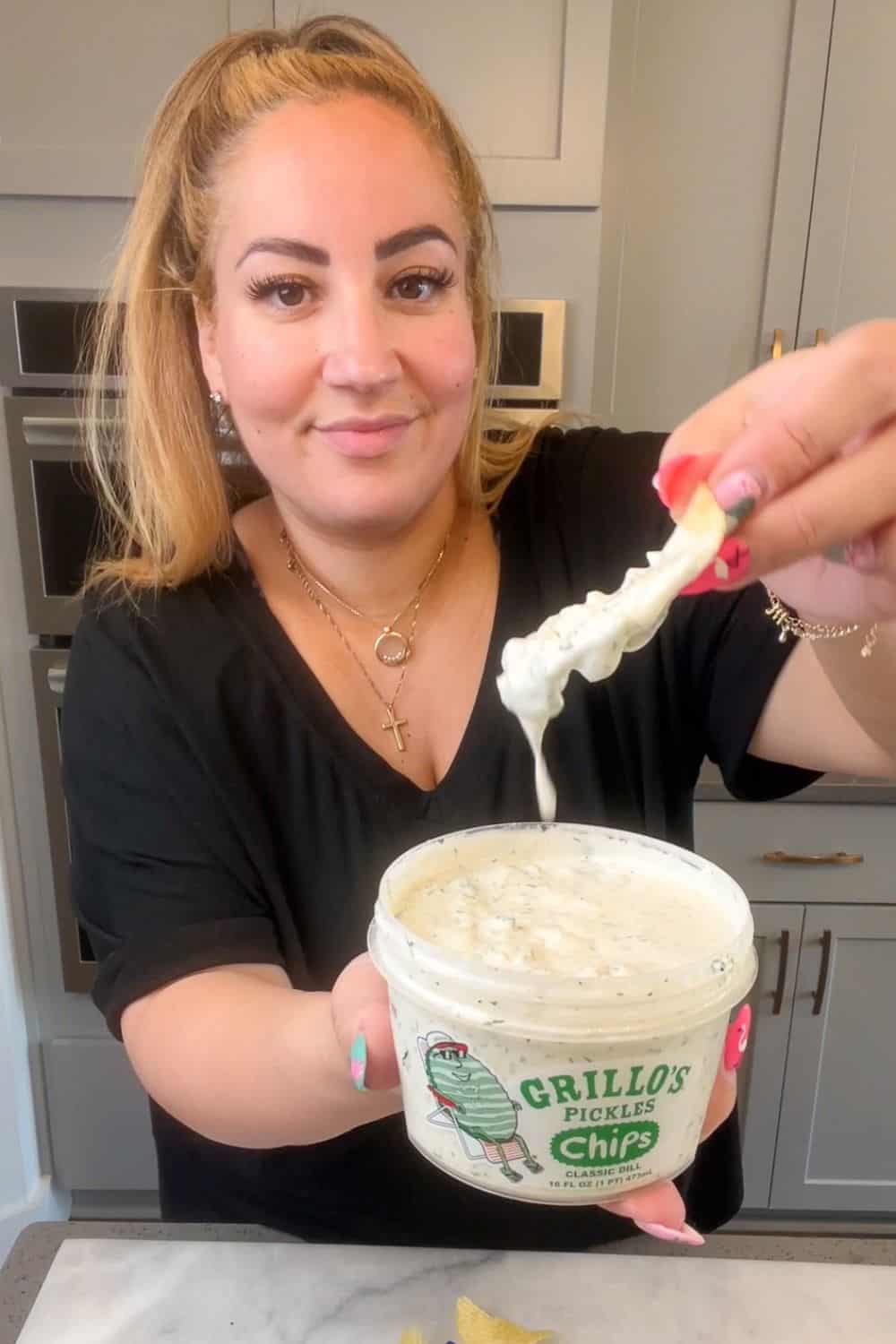 dill pickle dip in a grillo's pickle tub