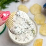 chip dip being held in hand