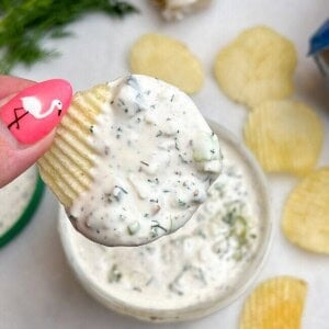 chip dip being held in hand