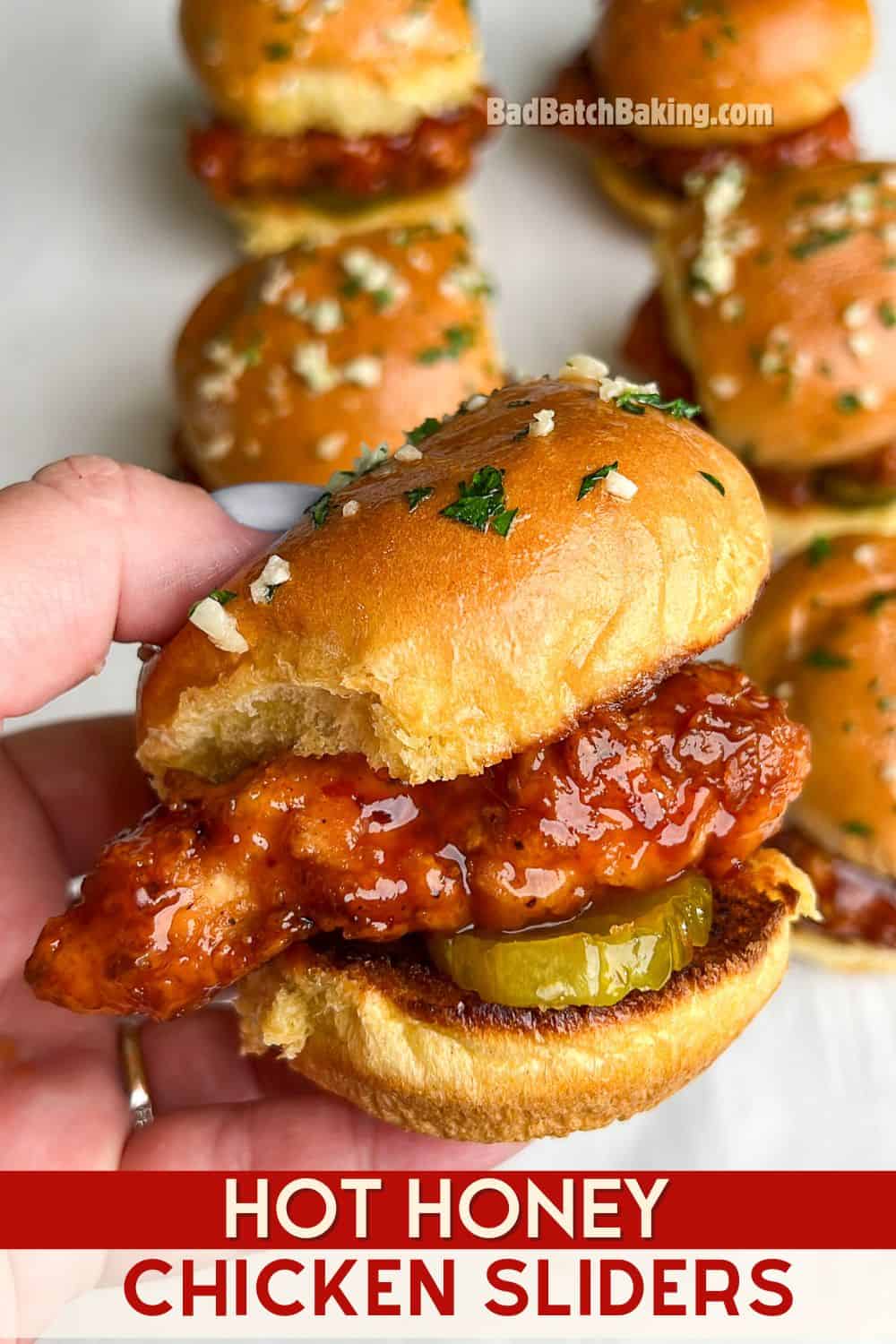 chicken sliders being held in hand