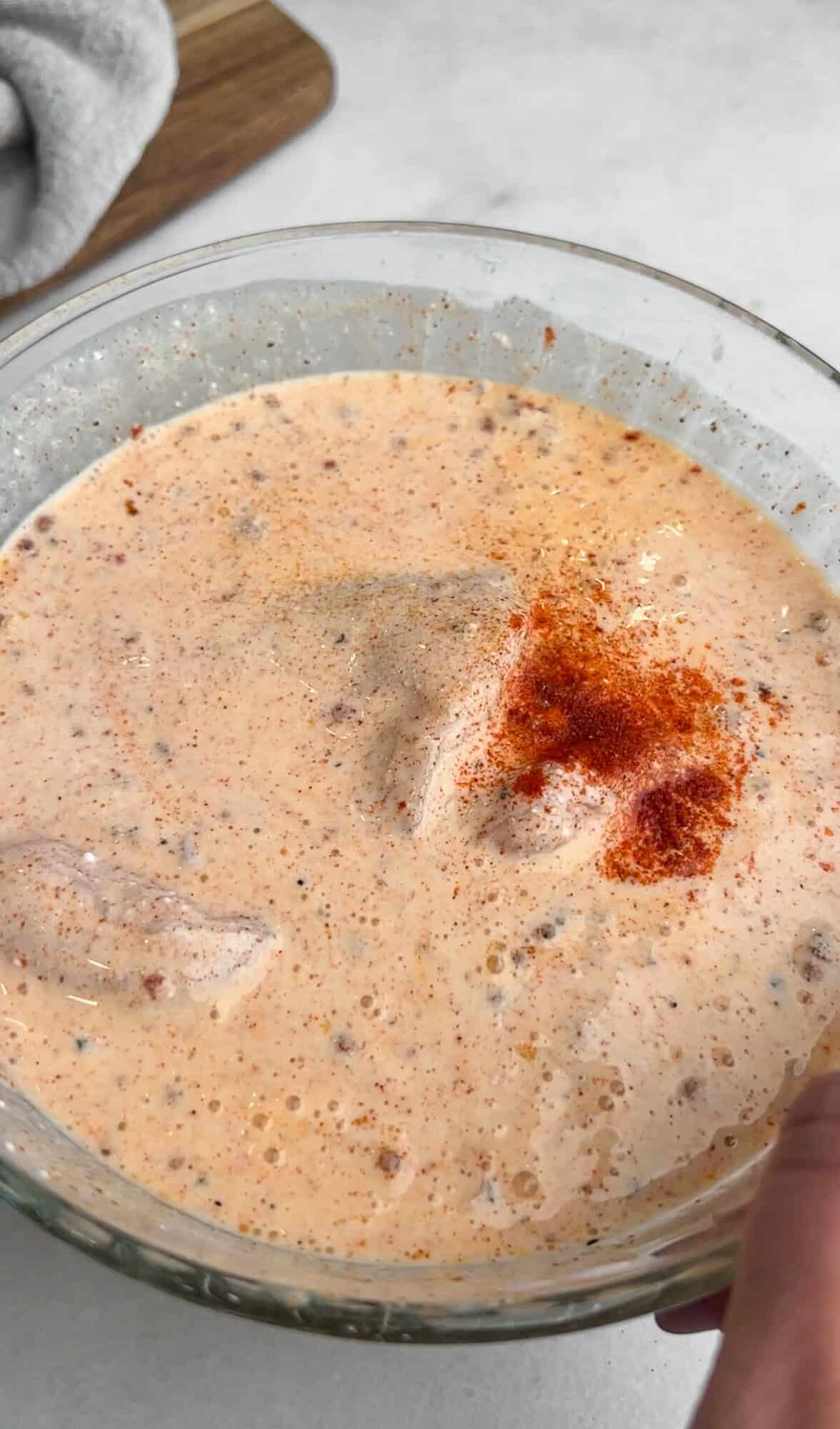 chicken marinading in wet batter