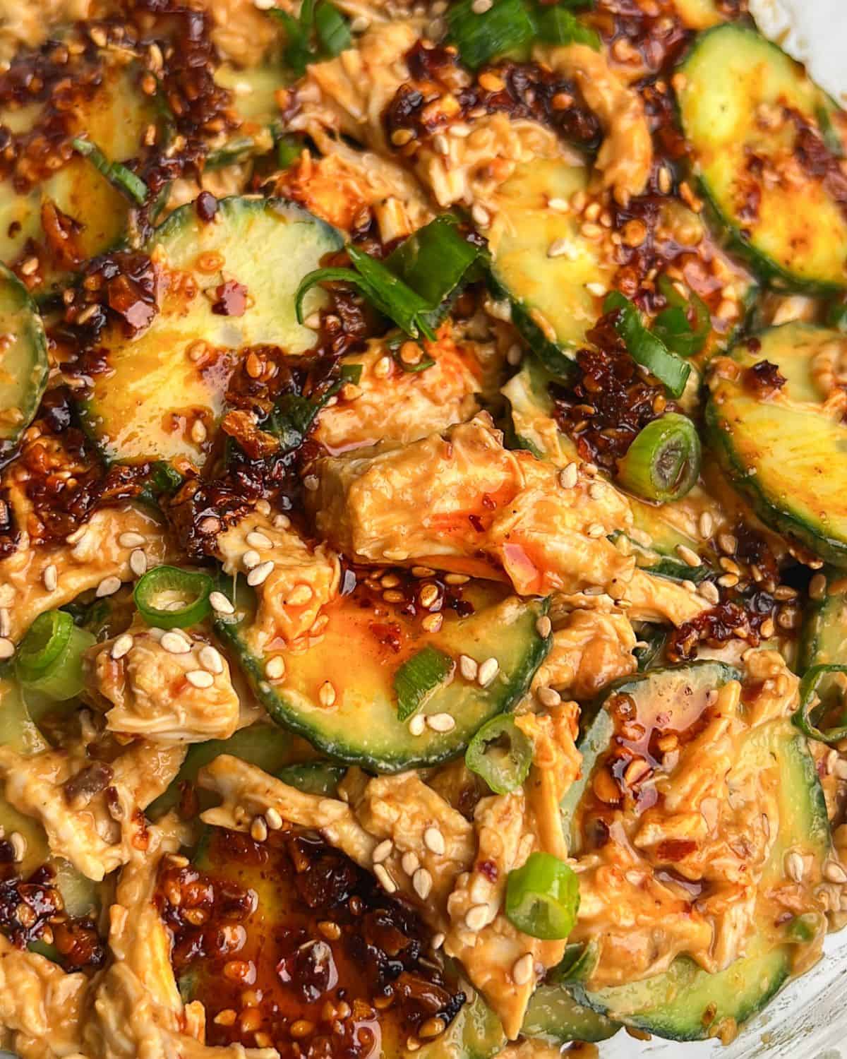 thai cucumber salad with chicken in a bowl