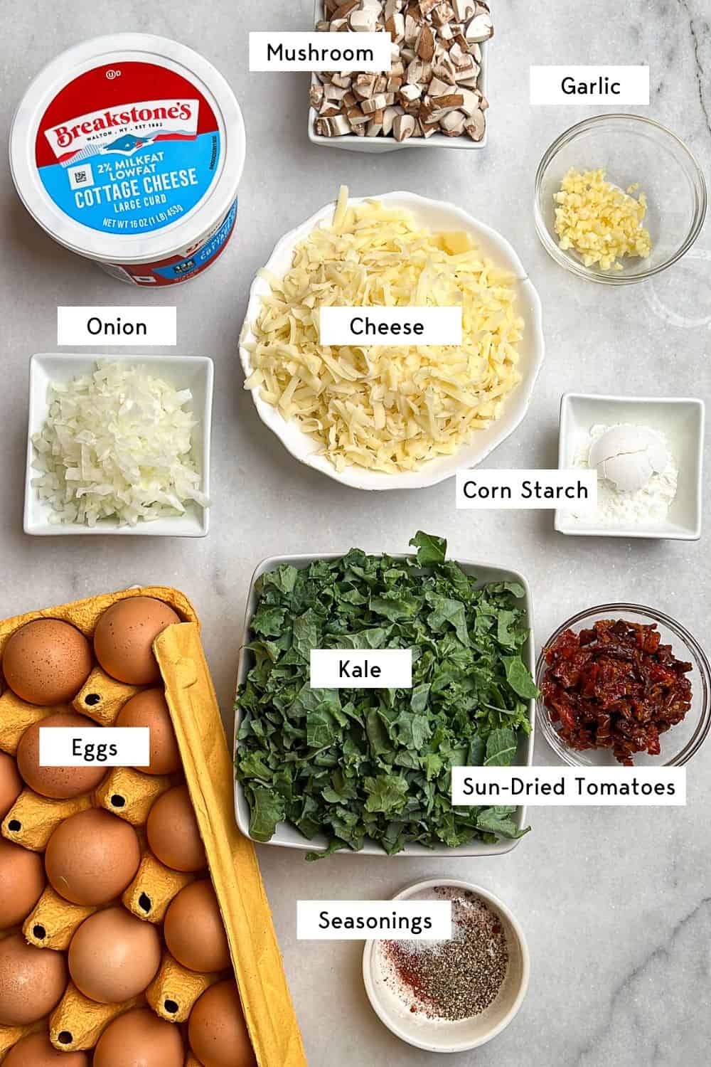 Labeled ingredients for kale and mushroom egg bites recipe.