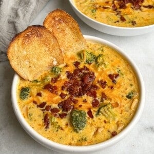 feature image for chicken broccoli cheddar soup in a bowl with toasted sourdough bread
