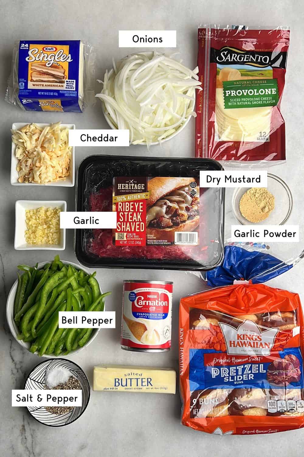 Labeled ingredients for Philly cheesesteak sliders.