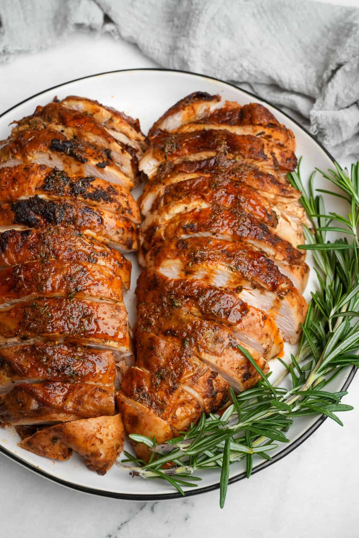 cajun butter turkey breasts sliced on a plate