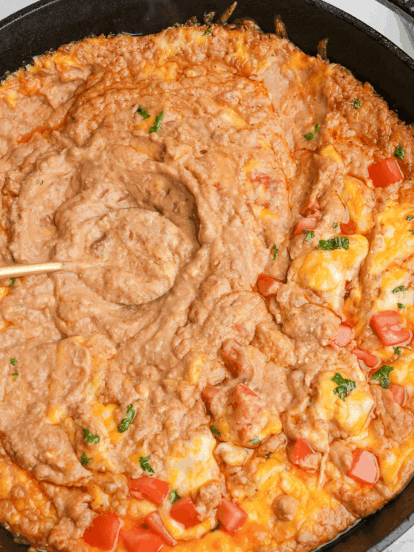 Featured image for cheesy refried bean dip.