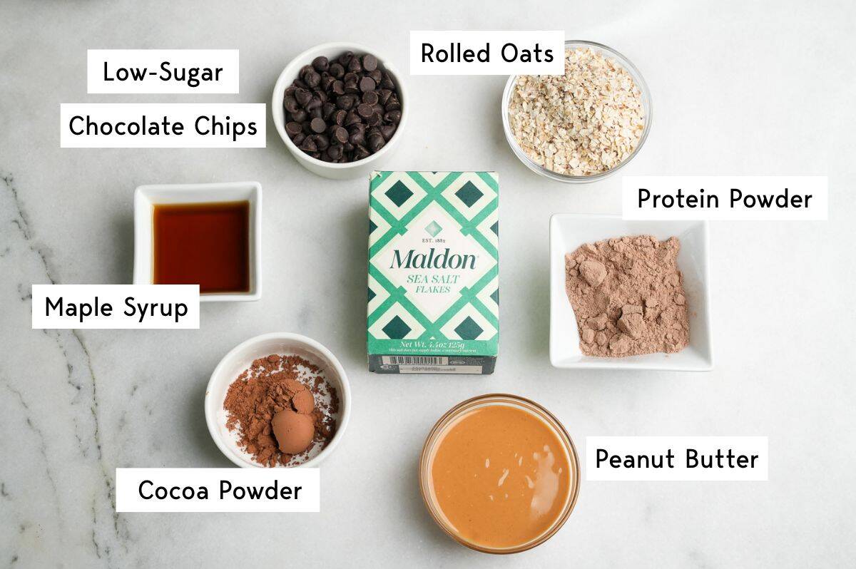 Labeled ingredients for chocolate peanut butter protein balls.
