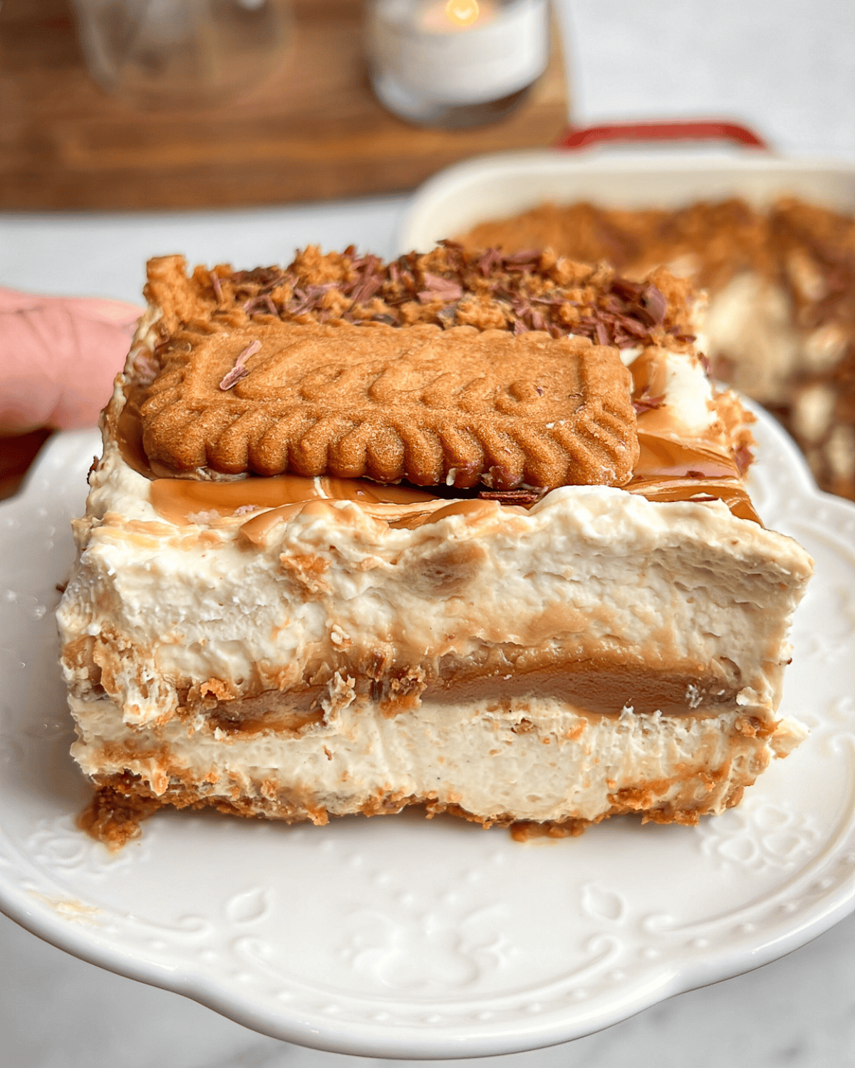a slice of biscoff cheesecake on a plate