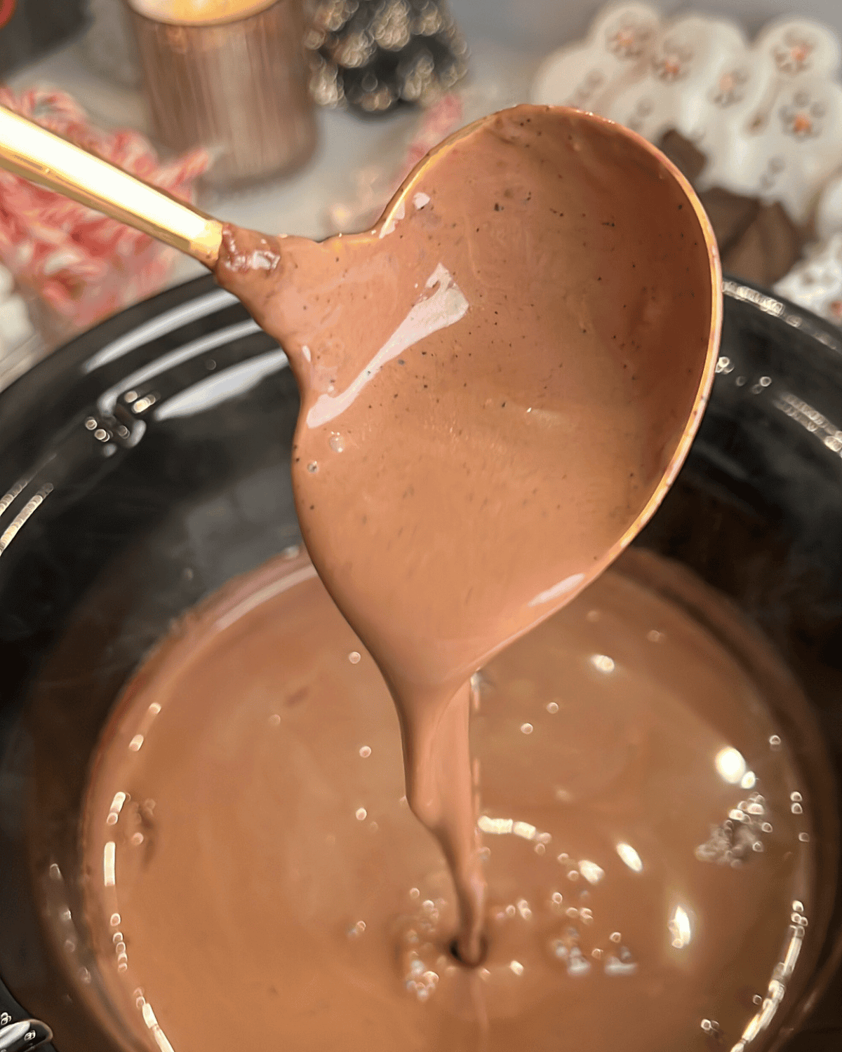slow cooker hot chocolate being laddled out
