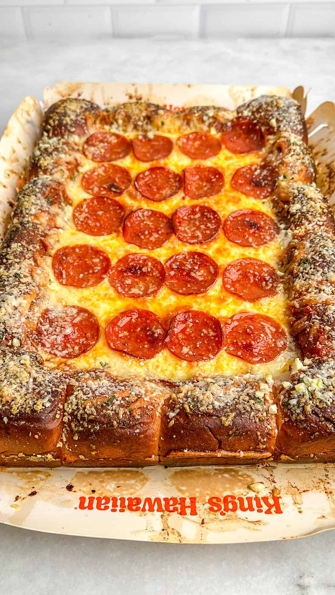 hawaiian roll pizza before it's sliced