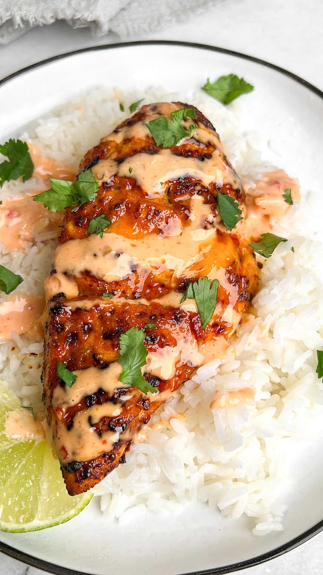 Bang bang chicken on a plate with white rice