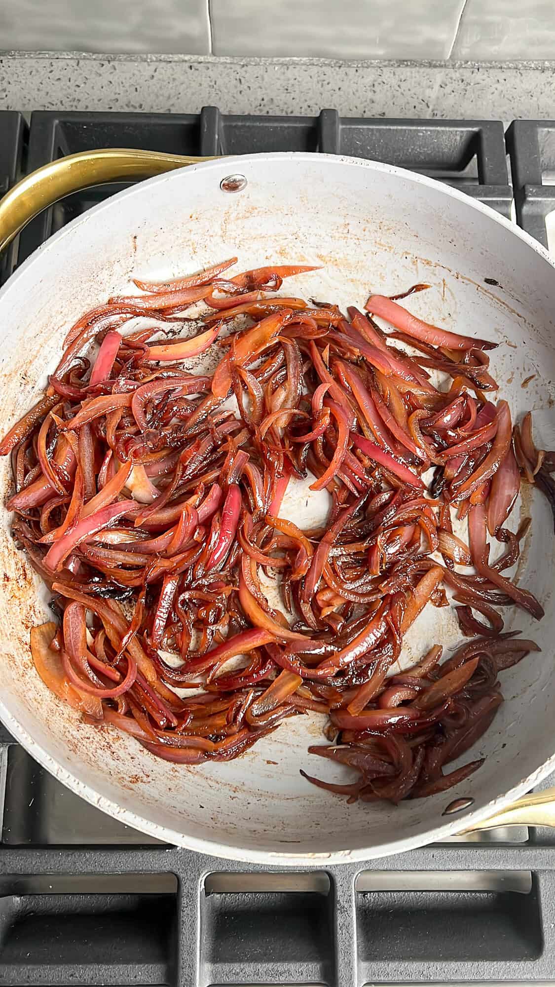 caramelized onions in a pan on the stove
