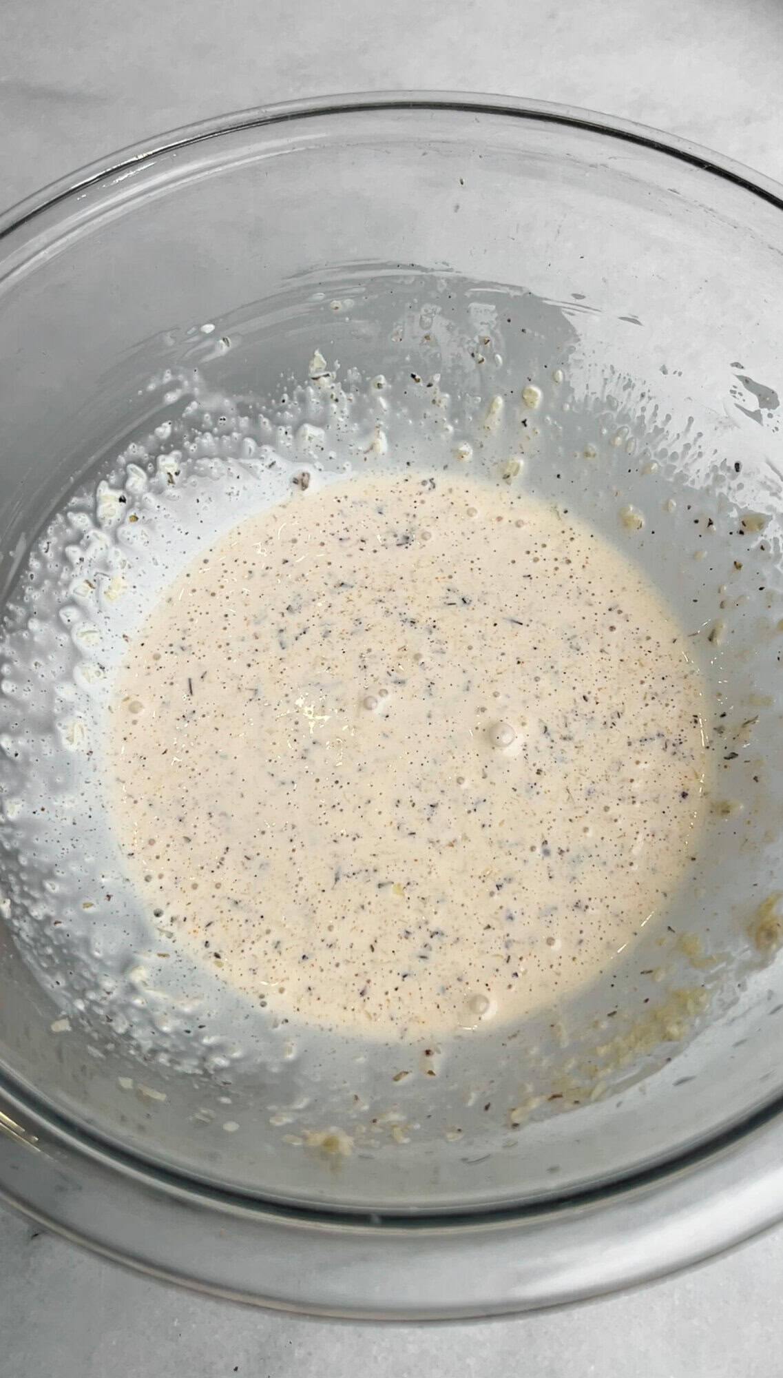 grinder salad dressing in a mixing bowl