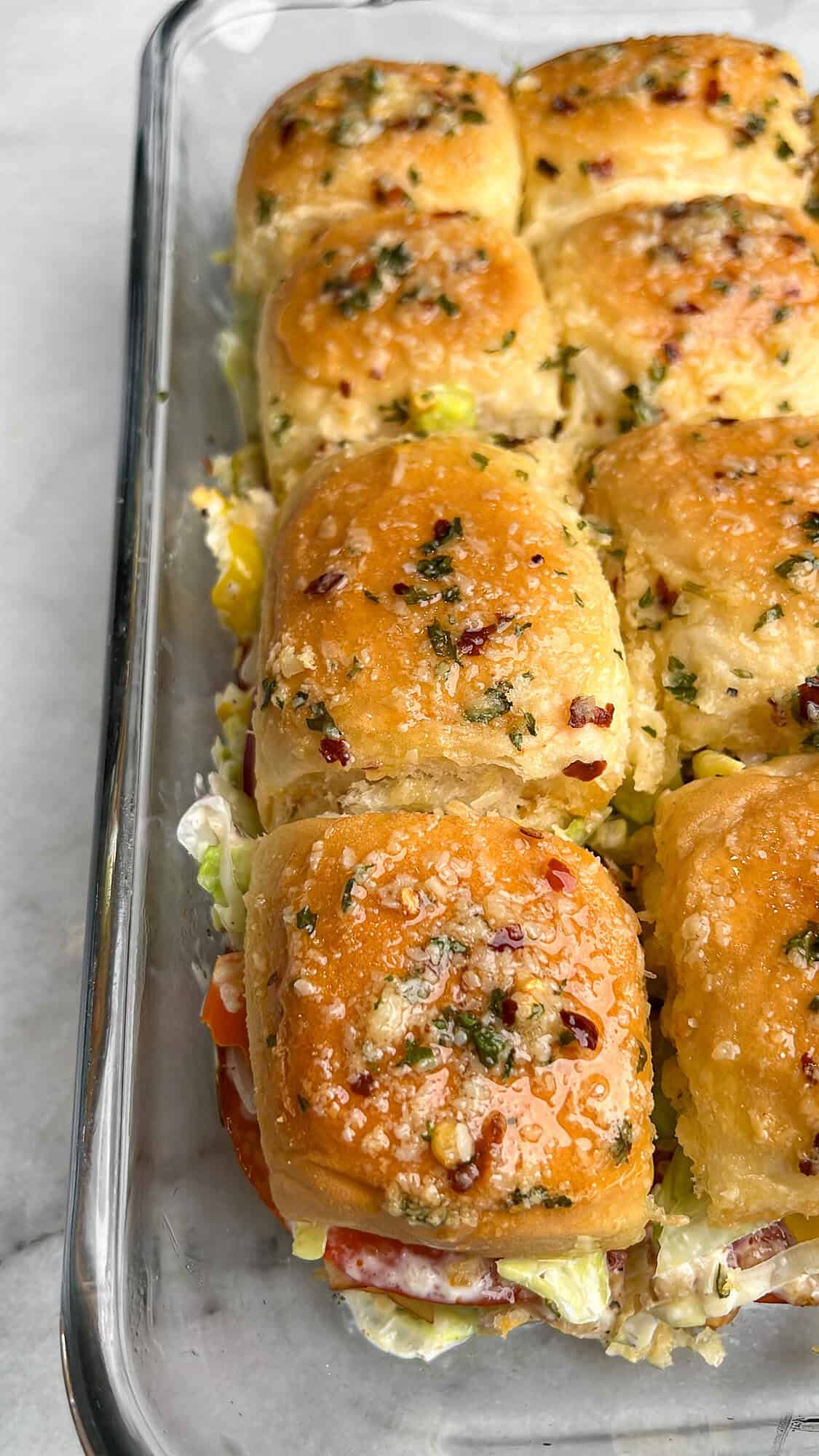 italian sub grinder sliders in a pan