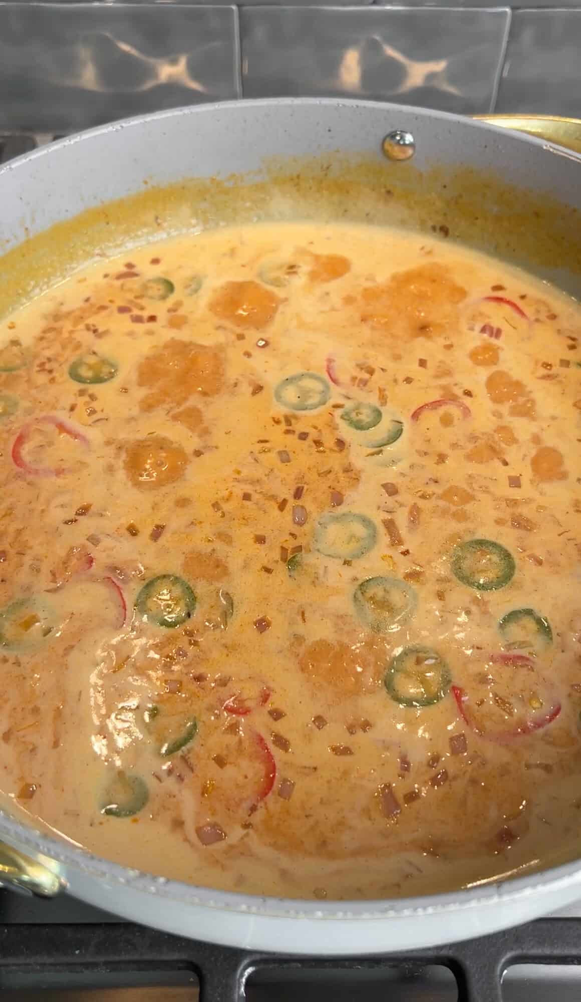 brothy rice base simmering in a pan