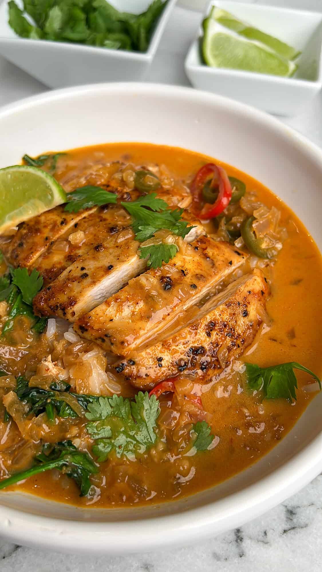 thai coconut brothy rice in a bowl up close