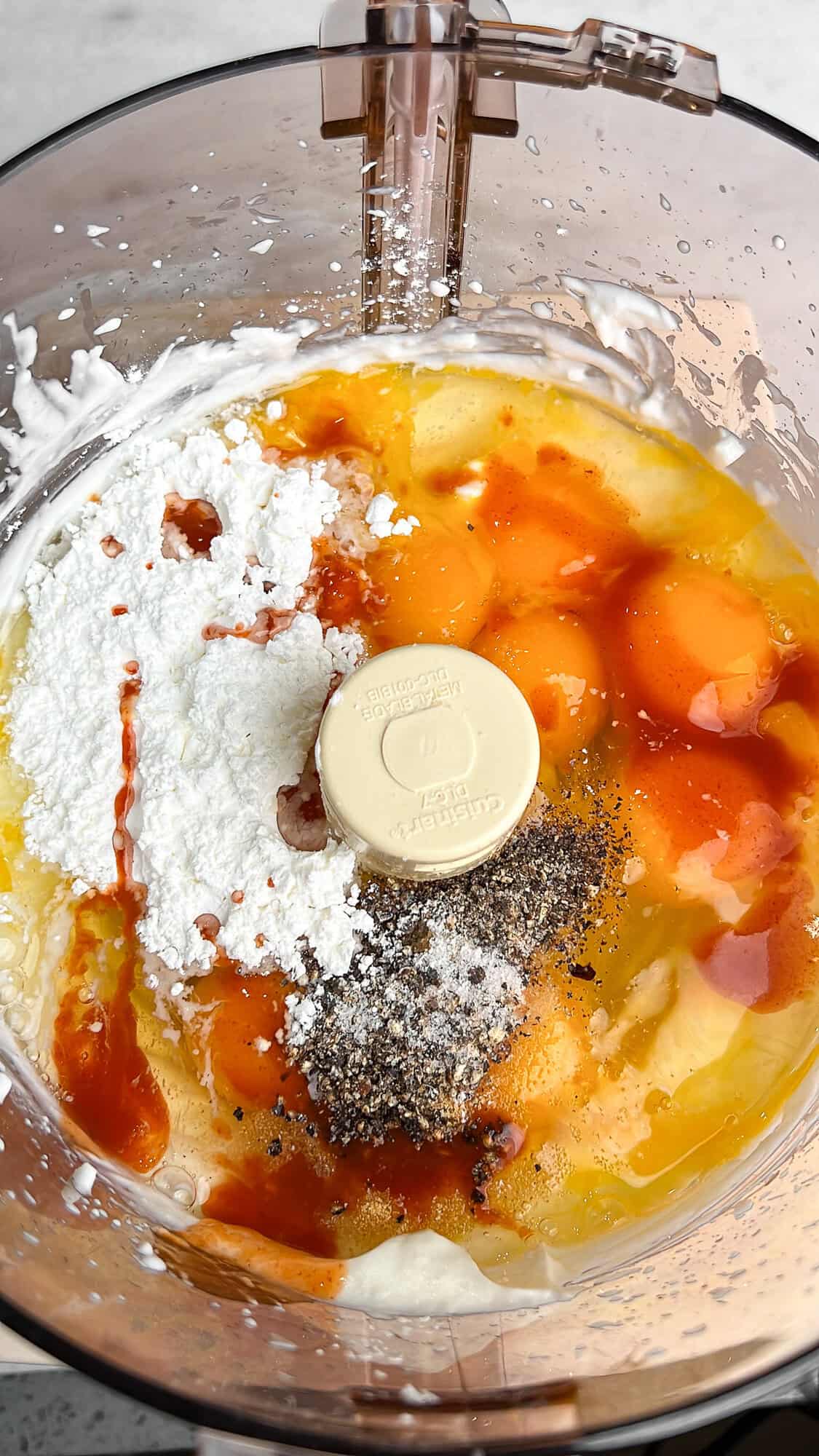 ingredients for the egg bites in a food processor before cheese is added