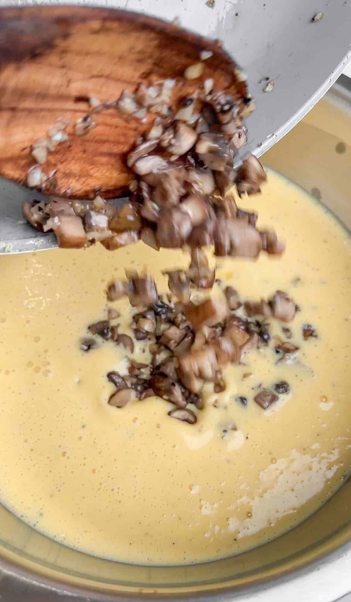 add mushrooms to the egg mixture