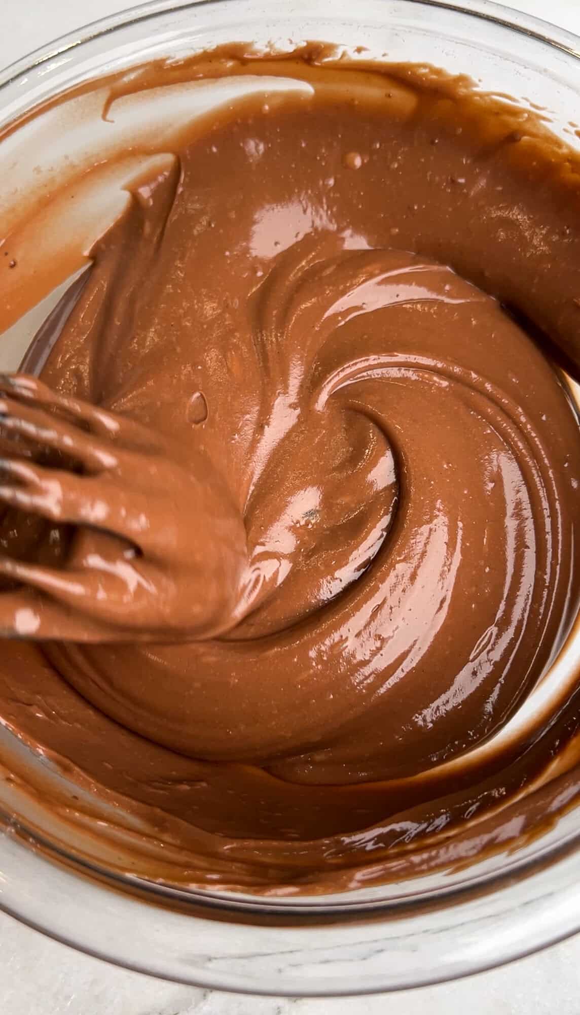 whisking instant pudding in a bowl