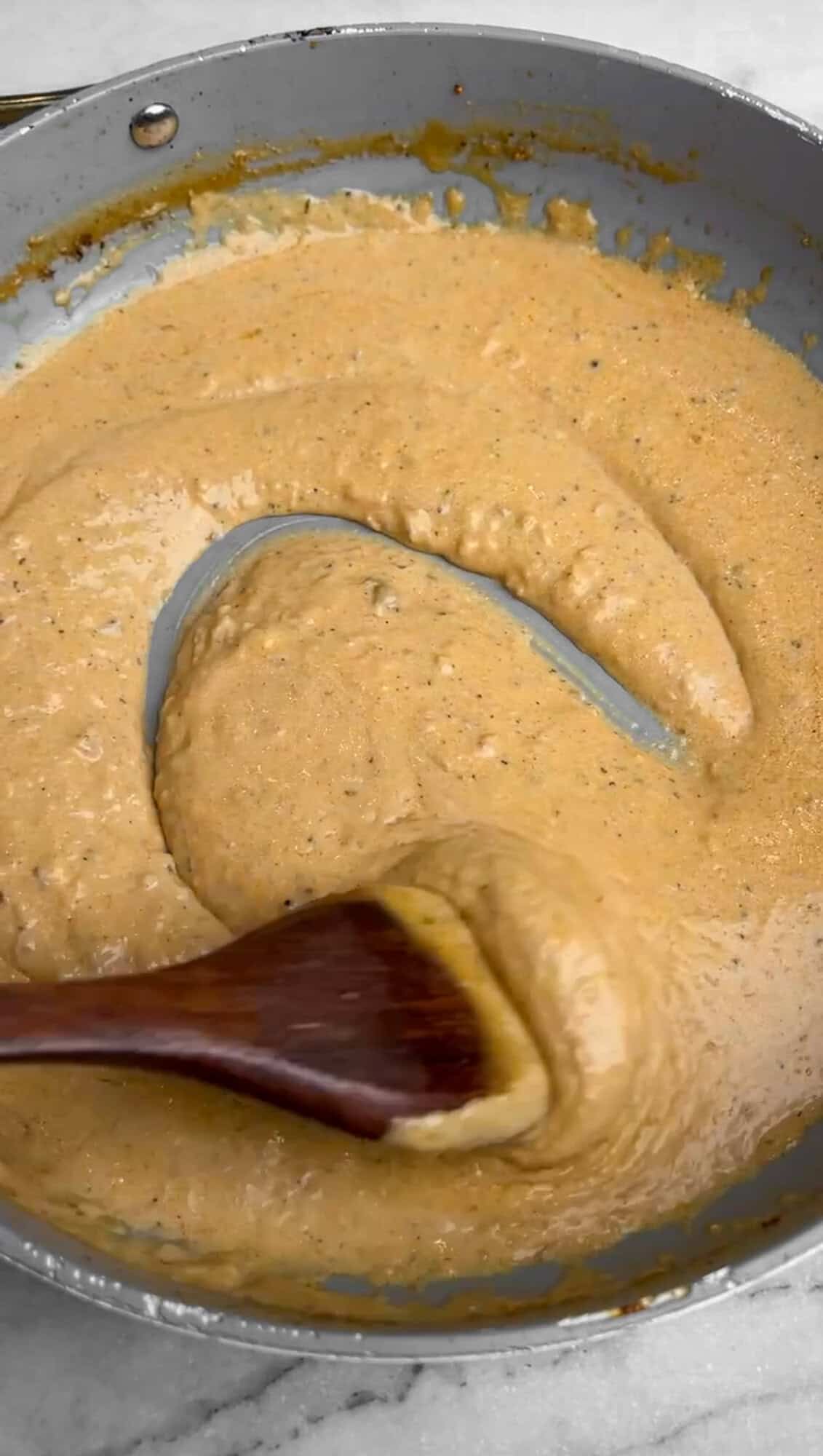 cajun alfredo sauce in a pan