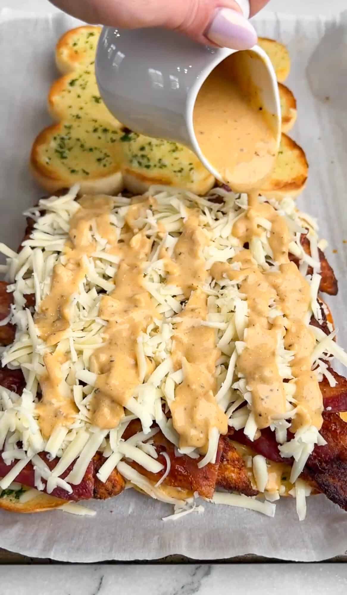 alfredo sauce put over the chicken alfredo sliders