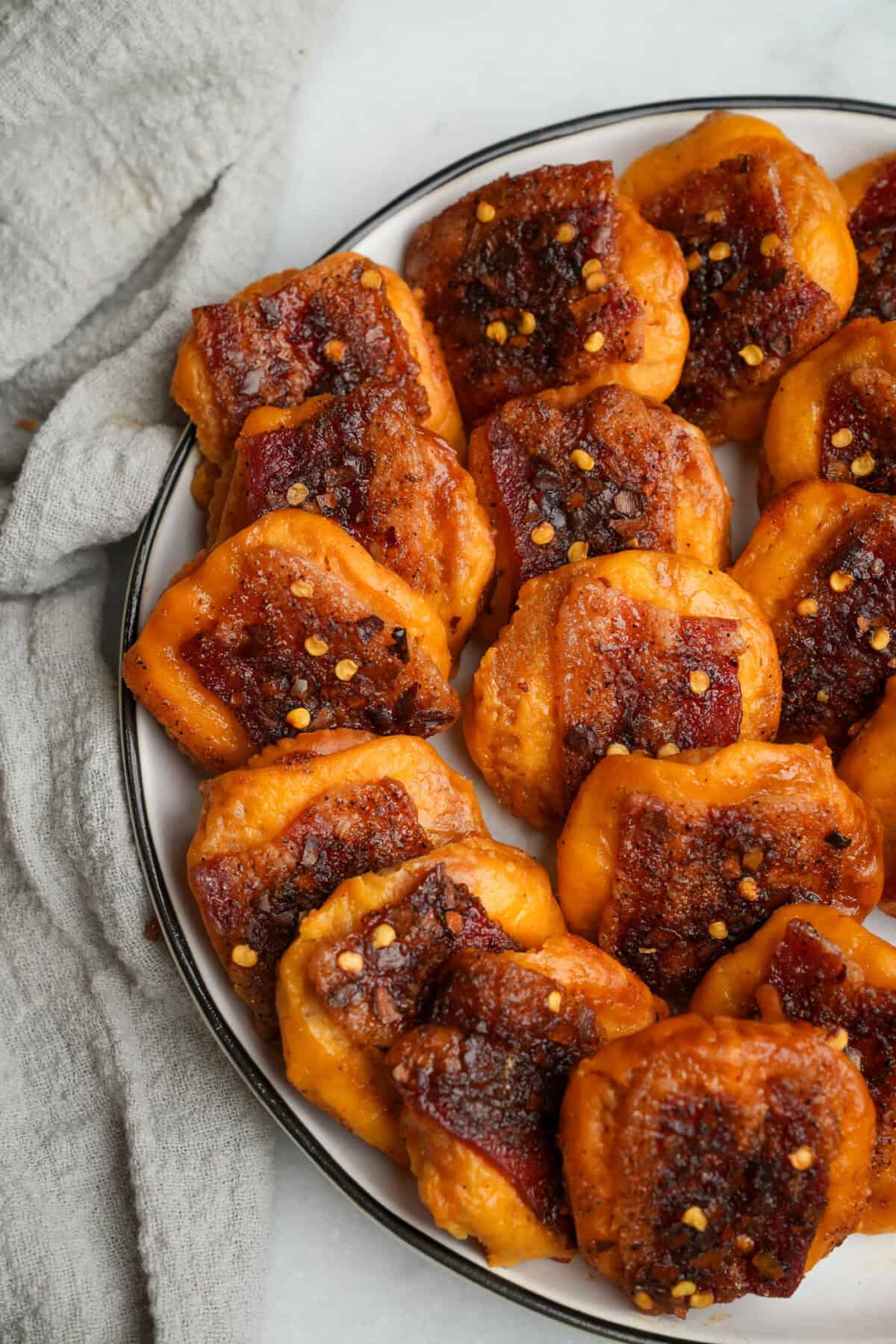 bacon crackers on a plate to serve at a party