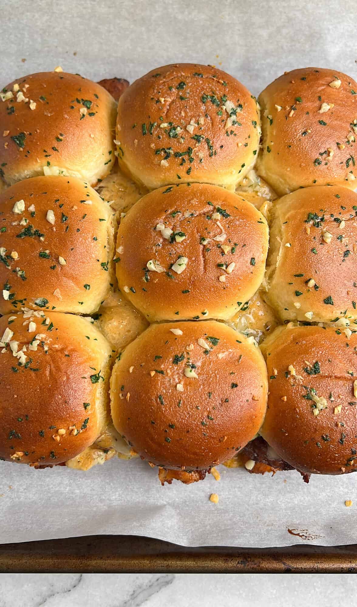 chicken alfredo sliders on a pan