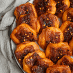 cheddar bacon crackers on a plate for a party