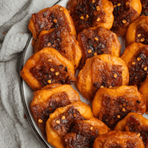 cheddar bacon crackers on a plate for a party
