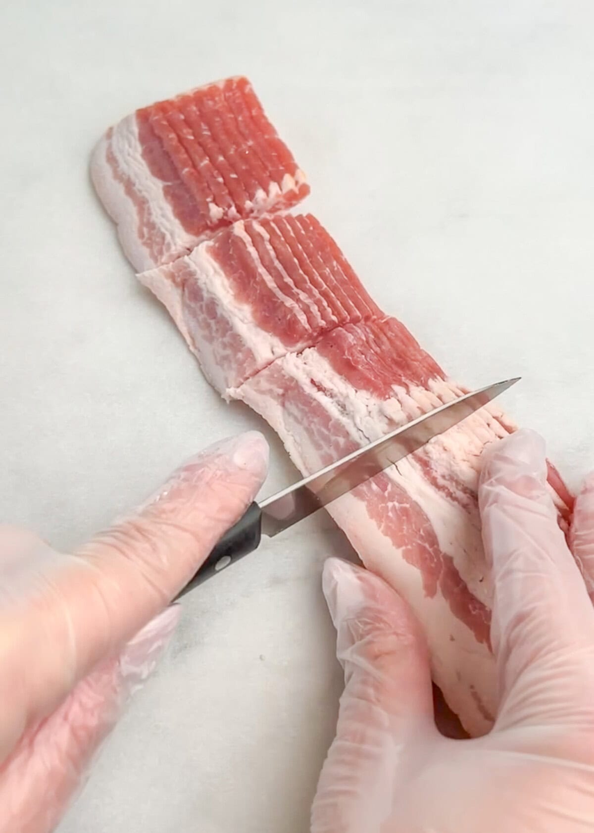 how to make cheddar bacon crackers, slicing the bacon