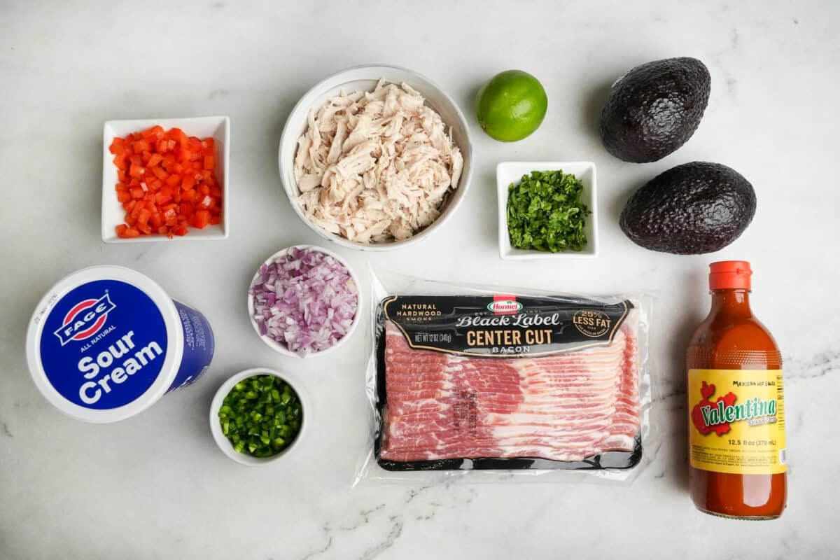 measured ingredients for guacamole chicken salad