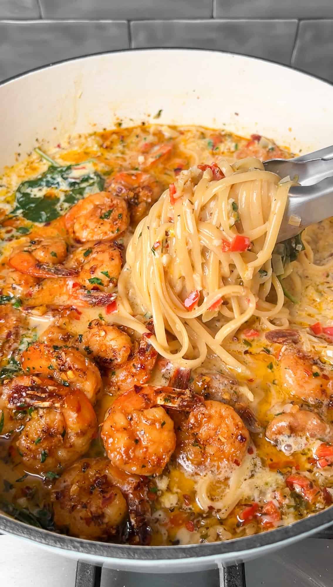 shrimp and linguine in a pot for shrimp scampi