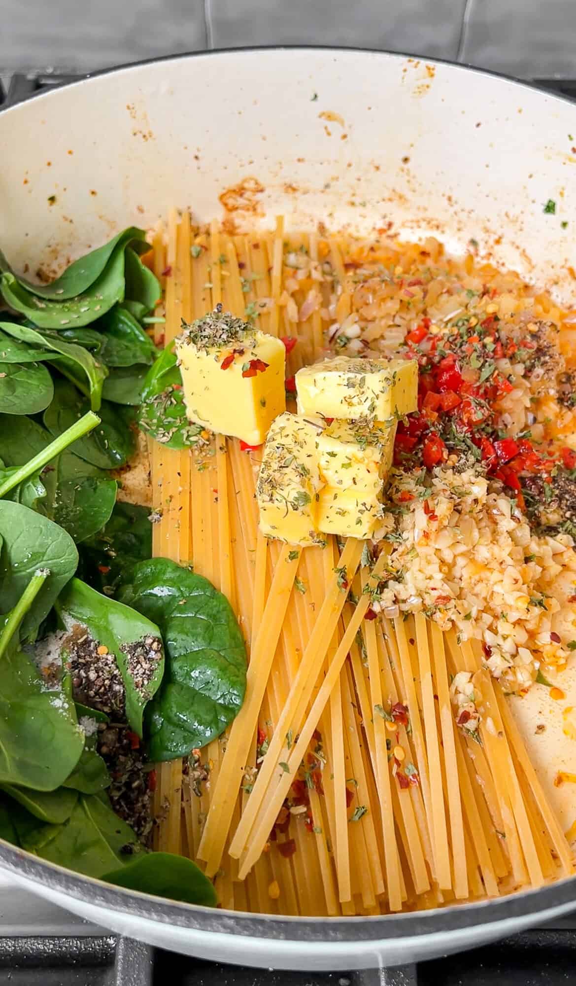 ingredients for one-pot shrimp scampi in a pan