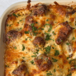 steak and potatoes with alfredo sauce