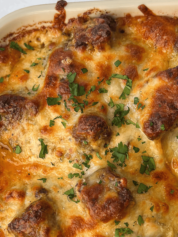 steak and potatoes with alfredo sauce