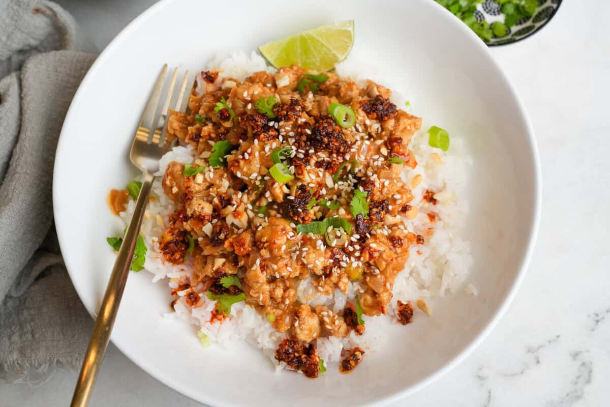 chili oil chicken and rice in a bowl