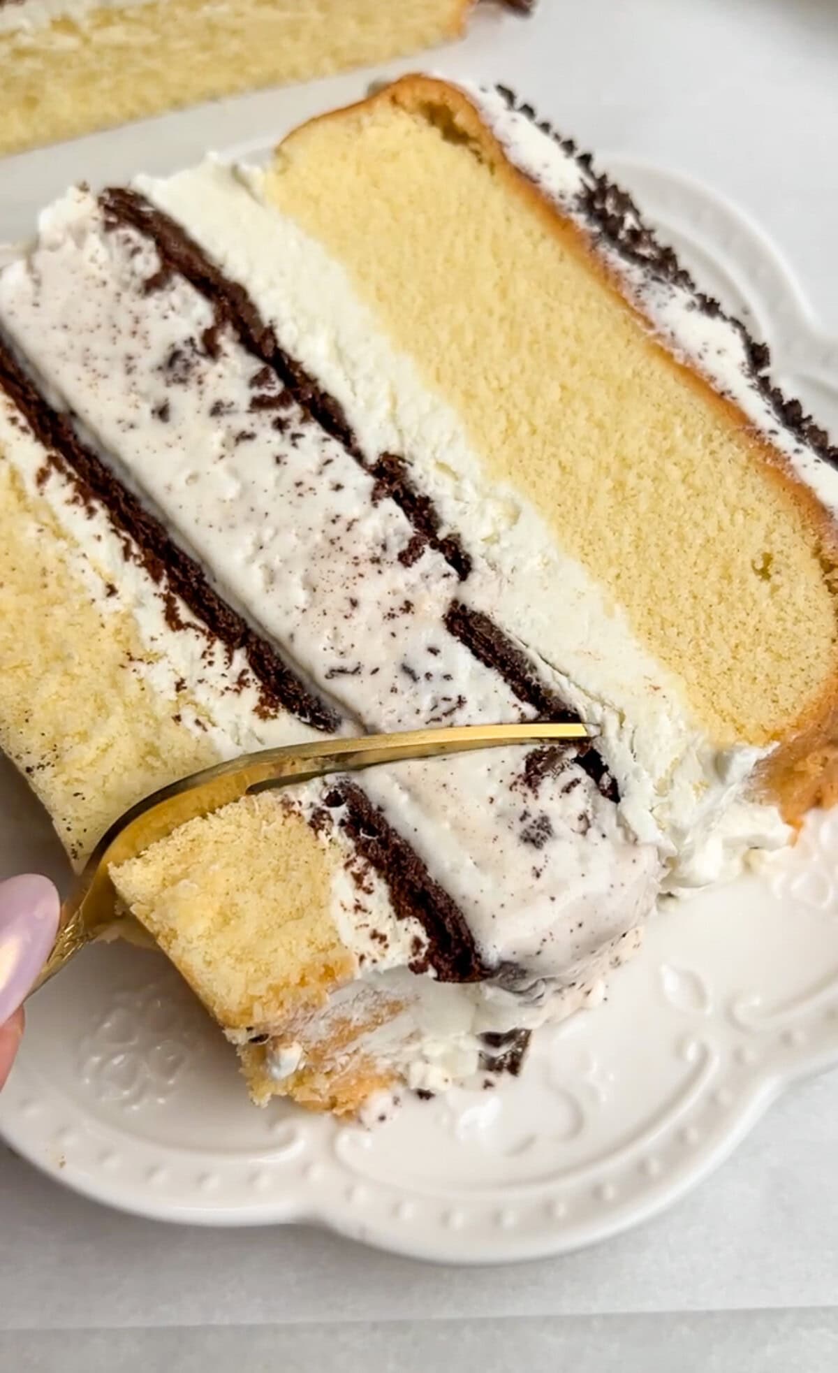 cookies and cream ice cream cake poundcake sliced on a plate