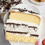 cookies and cream ice cream cake poundcake sliced on a plate