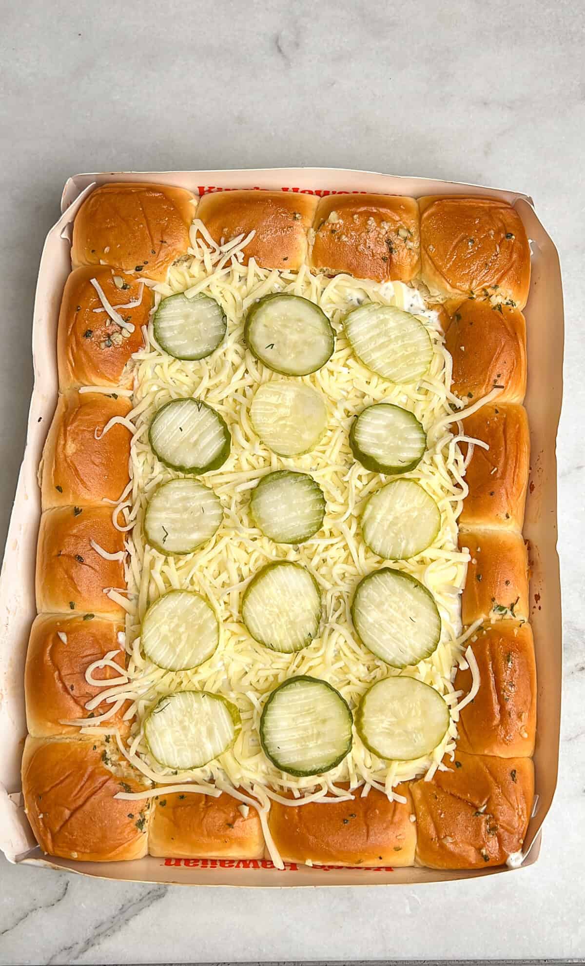 pickles added to the cheese and ranch layer