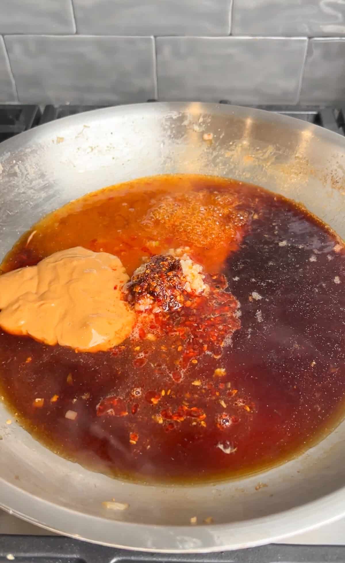 peanut chili oil ingredients in a pan