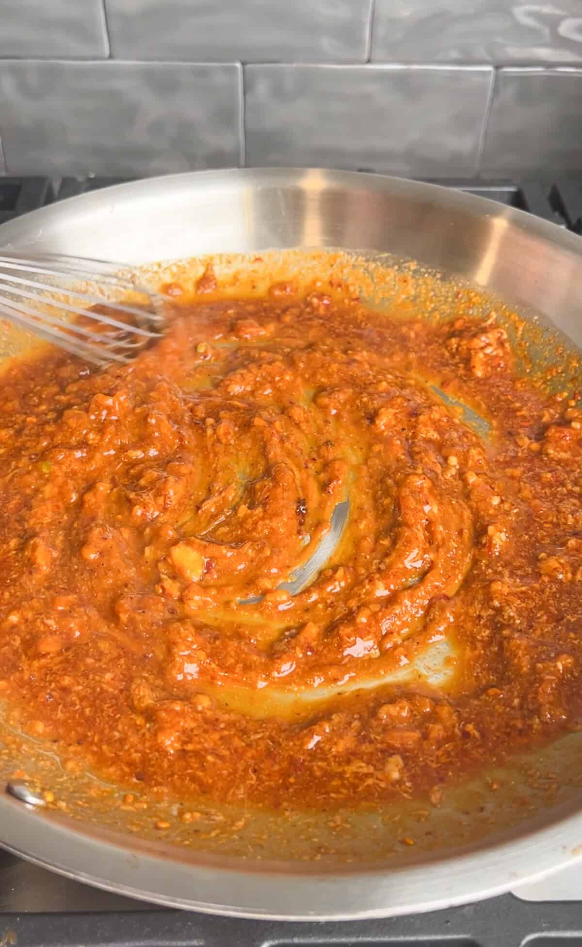 peanut chili oil sauce cooking in a pan