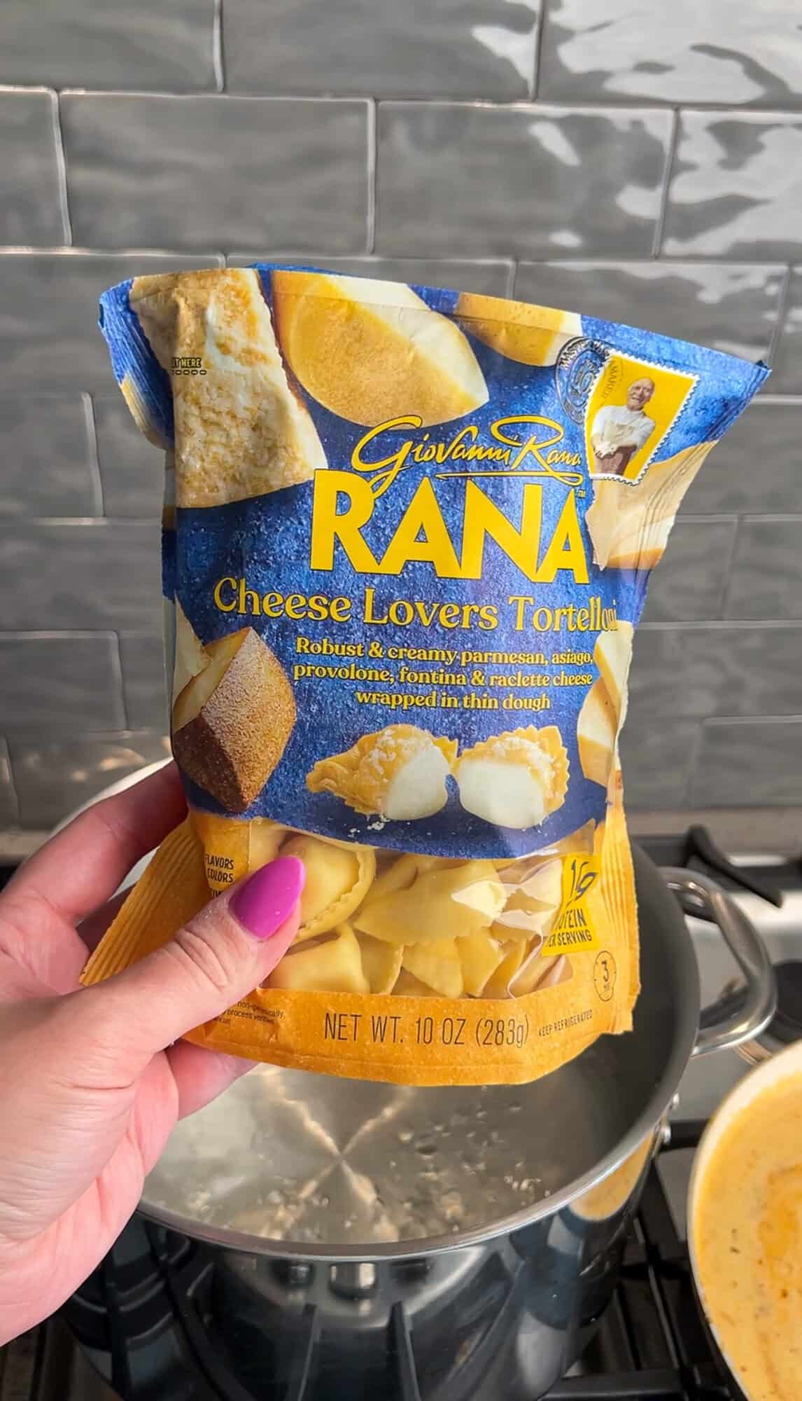 adding the tortellini into the pan sauce