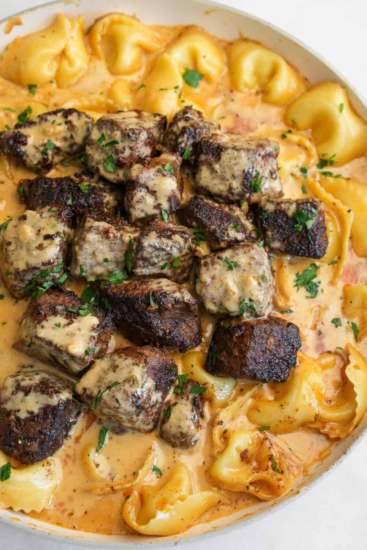 steak tortellini with cajun alfredo sauce