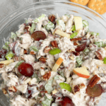 Close up of a bowl of Waldorf chicken salad