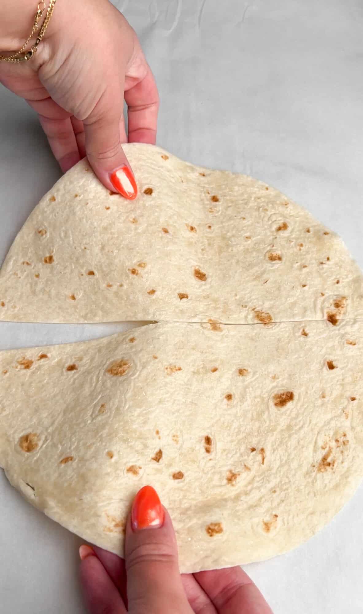 slice tortillas in half