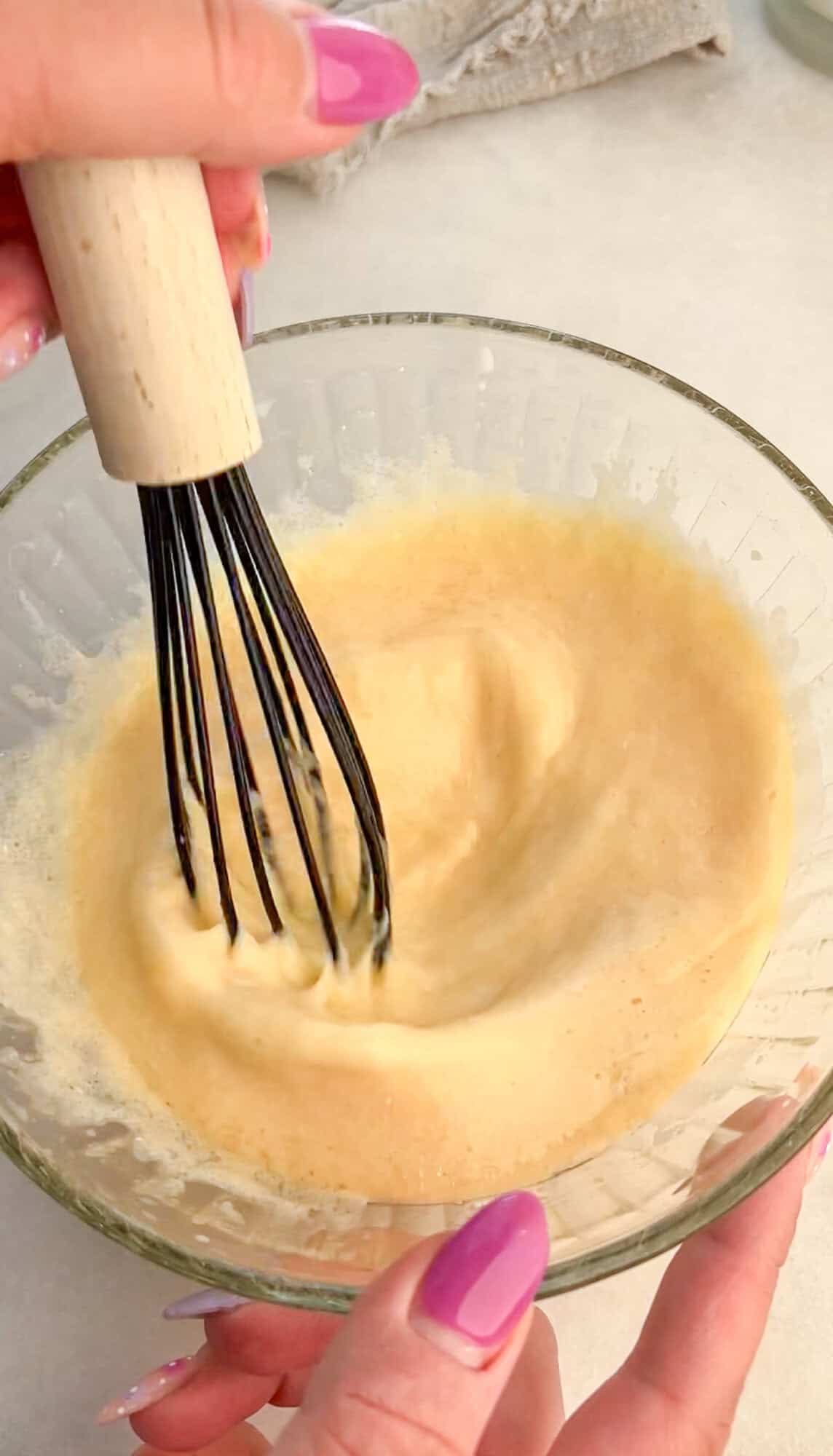 Whisking the wet cake batter ingredients
